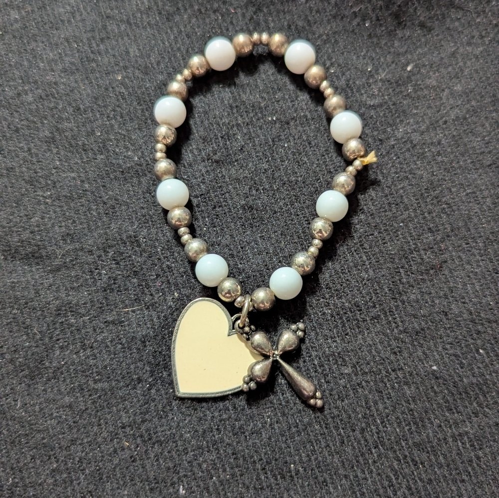 Silver Tone White Beaded Heart And Cross Charm Stretchy Statement Bracelet